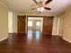 Spacious living area featuring wood floors and rustic sliding barn doors at 663 Embry Ln, Marietta, GA 30066