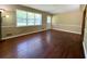 Bright living room featuring hardwood floors, natural lighting, and neutral paint scheme at 663 Embry Ln, Marietta, GA 30066