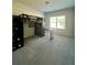 Bedroom features a loft bed, desk, and a large window for natural light at 7665 Easton Valley Ln, Cumming, GA 30028