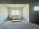 Bright bonus room with neutral walls, carpet, and natural light from windows at 7665 Easton Valley Ln, Cumming, GA 30028
