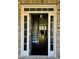 A well lit entry way with a staircase at 7665 Easton Valley Ln, Cumming, GA 30028
