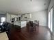 Spacious kitchen features white cabinets and stainless steel appliances at 7665 Easton Valley Ln, Cumming, GA 30028