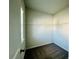A simple walk-in closet with shelves, carpet floor, and neutral color at 7665 Easton Valley Ln, Cumming, GA 30028
