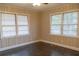 Inviting bedroom with hardwood floors and abundant natural light at 8424 Taylor Rd, Riverdale, GA 30274