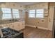 Well-lit kitchen with granite countertops and stainless-steel appliances at 8424 Taylor Rd, Riverdale, GA 30274