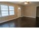 Bright living room featuring hardwood floors and natural light at 8424 Taylor Rd, Riverdale, GA 30274