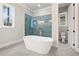 Bathroom offers soaking tub, tiled shower, separate toilet room, and marble flooring at 3812 Havenrock Dr, Marietta, GA 30066