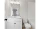 Bathroom with a vanity, toilet, and tile walls at 3812 Havenrock Dr, Marietta, GA 30066