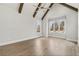 Vaulted bedroom featuring exposed beams, ceiling fan, beautiful windows and hardwood floors at 3812 Havenrock Dr, Marietta, GA 30066