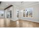 Bright dining room with hardwood floors, large windows, and sliding glass doors at 3812 Havenrock Dr, Marietta, GA 30066