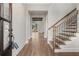 Open foyer showcases hardwood floors, staircase, and views into the expansive living space beyond at 3812 Havenrock Dr, Marietta, GA 30066
