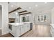Bright kitchen features an island with white countertops, and hardwood flooring at 3812 Havenrock Dr, Marietta, GA 30066
