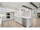Bright kitchen features an island with stainless steel appliances, and hardwood flooring at 3812 Havenrock Dr, Marietta, GA 30066
