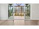 Covered porch showing access to the house, wood floors, and a view of the backyard at 3812 Havenrock Dr, Marietta, GA 30066