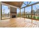 Covered back porch with a brick fireplace and views of the private backyard at 3812 Havenrock Dr, Marietta, GA 30066