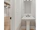 Powder room featuring a pedestal sink, and neutral decor at 3816 Havenrock Drive, Marietta, GA 30066