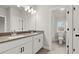 Well-lit bathroom with double vanity and access to the toilet and shower room at 3816 Havenrock Drive, Marietta, GA 30066