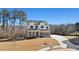Charming two-story home with manicured lawn, paved driveway, stone and siding exterior, and attached garage at 3816 Havenrock Drive, Marietta, GA 30066