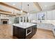 Open concept kitchen and living room with large center island and stainless appliances at 3816 Havenrock Drive, Marietta, GA 30066