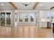 Open-concept living space with hardwood floors and large windows allowing ample natural light at 3816 Havenrock Drive, Marietta, GA 30066
