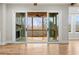 Living room sliding glass doors open to screened in porch with fireplace at 3816 Havenrock Drive, Marietta, GA 30066