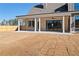 Open backyard with covered patio and generous space for outdoor activities and landscaping at 3819 Havenrock Dr, Marietta, GA 30066