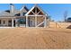 Expansive backyard showcasing a covered patio, ample green space and privacy fence at 3819 Havenrock Dr, Marietta, GA 30066