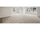 Spacious bedroom with carpet flooring and windows with backyard views at 3819 Havenrock Dr, Marietta, GA 30066