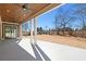 Spacious covered patio with wood ceiling, ceiling fans, and ample outdoor space at 3819 Havenrock Dr, Marietta, GA 30066