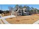 Stunning two-story home featuring a spacious driveway, an attached two-car garage, and manicured front yard at 3819 Havenrock Dr, Marietta, GA 30066