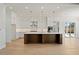 Modern kitchen featuring white cabinets, a central island, stainless steel appliances, and recessed lighting at 3819 Havenrock Dr, Marietta, GA 30066