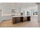 Modern kitchen featuring a large island, stainless steel appliances, and stylish pendant lighting at 3819 Havenrock Dr, Marietta, GA 30066