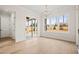 Bright living room with sliding doors, a view of the backyard, and modern chandelier at 3819 Havenrock Dr, Marietta, GA 30066