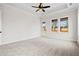 Large main bedroom featuring neutral walls and carpet floors, a ceiling fan, and plenty of natural light at 3819 Havenrock Dr, Marietta, GA 30066
