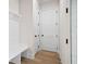 Bright mud room with white bench and storage at 3819 Havenrock Dr, Marietta, GA 30066