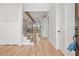 Inviting foyer with hardwood floors, staircase, and view into living spaces at 3820 Havenrock Dr, Marietta, GA 30066