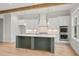 Bright kitchen boasts white cabinets, pendant lighting, and a large island at 3820 Havenrock Dr, Marietta, GA 30066