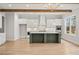 Kitchen boasts stainless appliances, modern backsplash, and oversized island at 3820 Havenrock Dr, Marietta, GA 30066