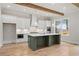 Kitchen featuring stainless appliances, island with seating, and custom cabinetry at 3820 Havenrock Dr, Marietta, GA 30066