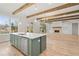 Open kitchen view with large island, stainless dishwasher, and view to living room at 3820 Havenrock Dr, Marietta, GA 30066