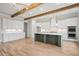 Spacious kitchen features a green island, stainless steel appliances, and exposed wood beams at 3820 Havenrock Dr, Marietta, GA 30066