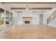 Bright living room with fireplace, wood beam and access to outdoor living space at 3820 Havenrock Dr, Marietta, GA 30066