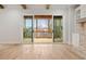 Spacious outdoor living space with screen, wood beam accent and brick fireplace at 3820 Havenrock Dr, Marietta, GA 30066