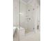 Shower with glass door and tile surround at 3820 Havenrock Dr, Marietta, GA 30066