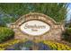 Stonehaven Pointe community sign amidst vibrant flowers and lush greenery at 5965 Ellington Cv, Cumming, GA 30040