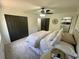 Bedroom with carpet, closet, ceiling fan and access to bathroom at 4651 S Roberts Drive, Sugar Hill, GA 30518
