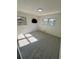 Bedroom featuring natural light, carpet flooring, and neutral walls at 4651 S Roberts Drive, Sugar Hill, GA 30518