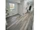 Dining area features light gray floors and a view to the outdoor landscape at 4651 S Roberts Drive, Sugar Hill, GA 30518
