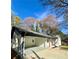 Lovely single-story home with a long carport and inviting curb appeal at 4651 S Roberts Drive, Sugar Hill, GA 30518