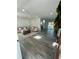 Bright living room featuring hardwood floors, recessed lighting, and neutral paint at 4651 S Roberts Drive, Sugar Hill, GA 30518